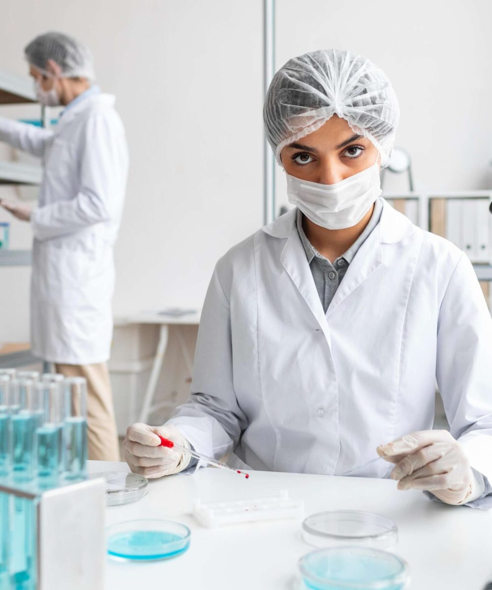 medium-shot-researcher-lab (1)